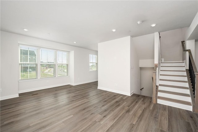 504 Nolan Cir, Cranberry Twp, PA 16066 - unfurnished living room featuring wood finished floors, healthy amount of natural light, stairs, and recessed lighting