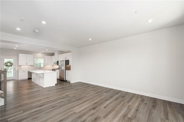 504 Nolan Cir, Cranberry Twp, PA 16066 - unfurnished living room featuring wood finished floors and recessed lighting