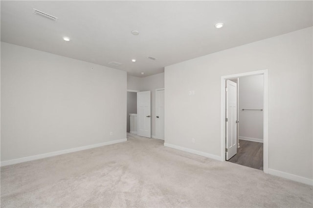 504 Nolan Cir, Cranberry Twp, PA 16066 - unfurnished bedroom featuring carpet floors, recessed lighting, and a walk in closet