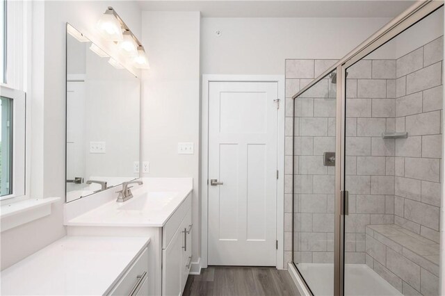 504 Nolan Cir, Cranberry Twp, PA 16066 - bathroom with vanity, a shower stall, and wood finished floors