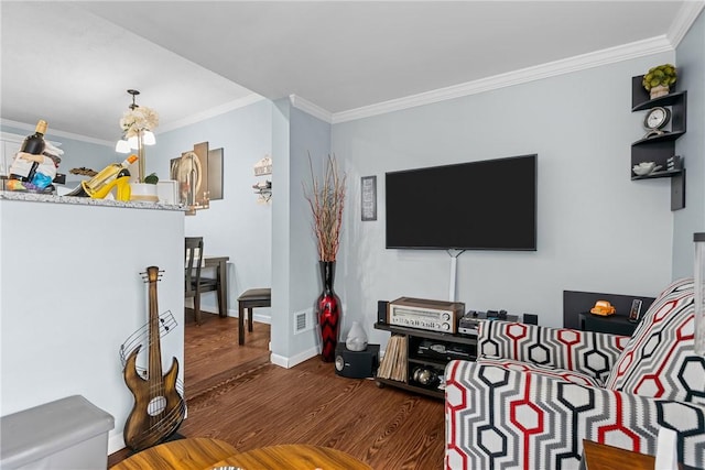 422 Ella St, Bloomfield, PA 15224 - living room with wood finished floors and crown molding