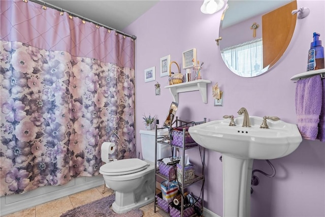 422 Ella St, Bloomfield, PA 15224 - full bathroom featuring tile patterned floors and curtained shower