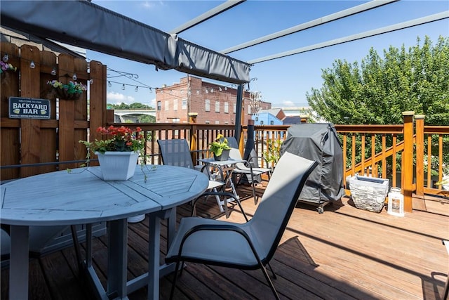 422 Ella St, Bloomfield, PA 15224 - wooden terrace with outdoor dining area and grilling area
