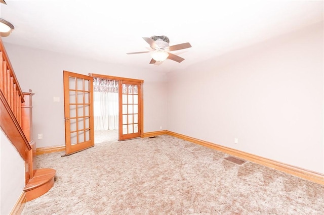 314 N 9th St, Apollo Boro, PA 15613 - unfurnished room with french doors, stairs, light carpet, and ceiling fan