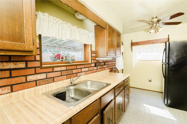 314 N 9th St, Apollo Boro, PA 15613 - kitchen featuring freestanding refrigerator, plenty of natural light, light countertops, and backsplash