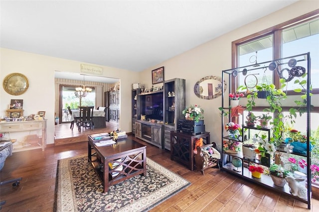 334 Park St, North Union Twp, PA 15401 - living room with hardwood / wood-style floors and a chandelier