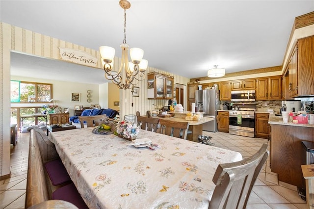334 Park St, North Union Twp, PA 15401 - dining room featuring a chandelier and light tile patterned floors