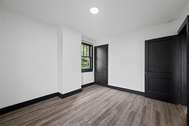 1462 Elm St, Wilkinsburg, PA 15221 - unfurnished bedroom featuring wood finished floors and baseboards