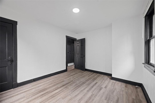 1462 Elm St, Wilkinsburg, PA 15221 - empty room with wood finished floors and baseboards