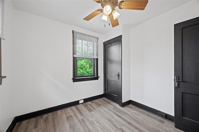 1462 Elm St, Wilkinsburg, PA 15221 - spare room featuring light wood-style flooring and a ceiling fan