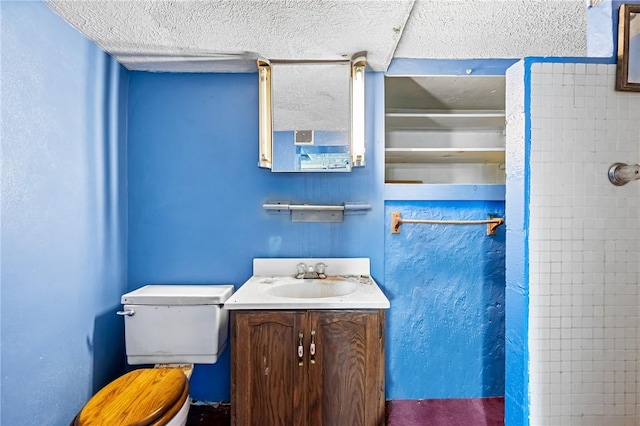 1860 Jancey St, Morningside, PA 15206 - bathroom featuring vanity and a textured ceiling