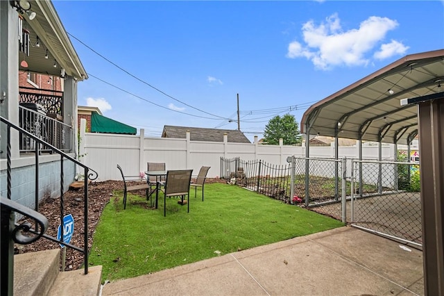 1860 Jancey St, Morningside, PA 15206 - view of yard featuring a carport and a gate