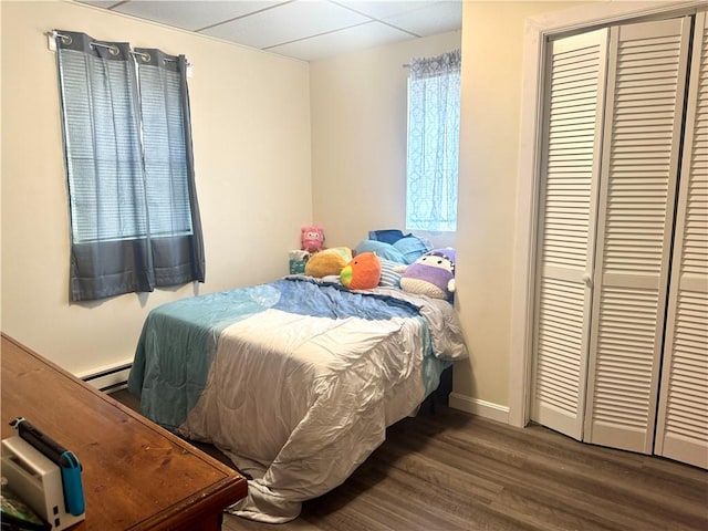 230 E Water St, Slippery Rock Boro, PA 16057 - bedroom featuring wood finished floors, baseboard heating, and a closet