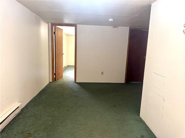230 E Water St, Slippery Rock Boro, PA 16057 - carpeted empty room featuring a baseboard heating unit and a smoke detector