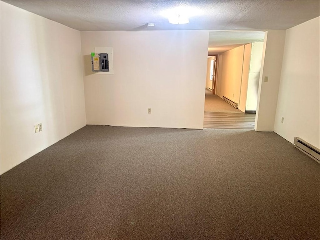 230 E Water St, Slippery Rock Boro, PA 16057 - empty room with light colored carpet, baseboard heating, electric panel, and a textured ceiling