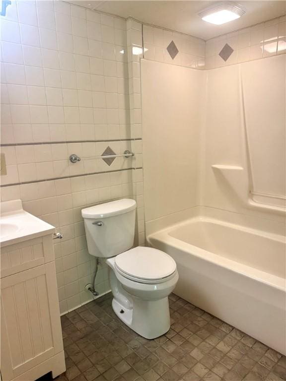 230 E Water St, Slippery Rock Boro, PA 16057 - bathroom featuring tile walls, vanity, and bathing tub / shower combination