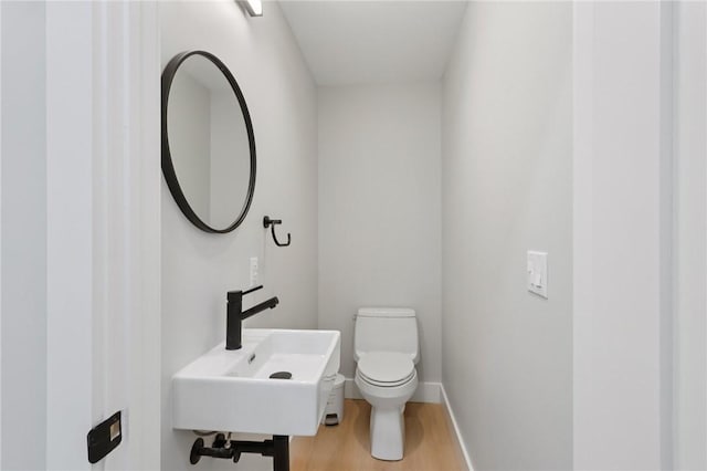 1211 Boyle St, Central North Side, PA 15212 - bathroom with toilet and wood finished floors