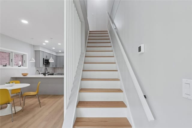 1211 Boyle St, Central North Side, PA 15212 - stairs featuring wood finished floors and recessed lighting