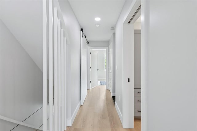 1211 Boyle St, Central North Side, PA 15212 - hallway with light wood-style floors and baseboards