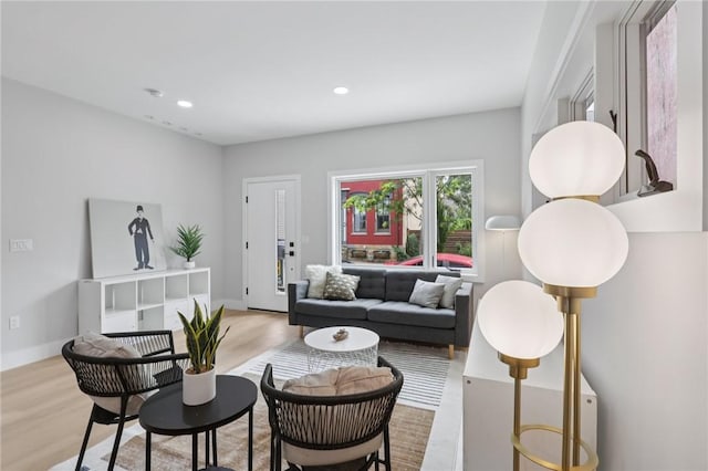 1211 Boyle St, Central North Side, PA 15212 - living area featuring wood finished floors and recessed lighting