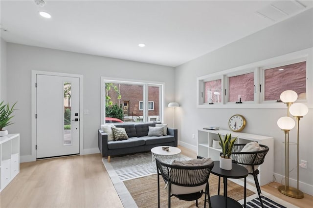 1211 Boyle St, Central North Side, PA 15212 - living room featuring light wood-style flooring and recessed lighting