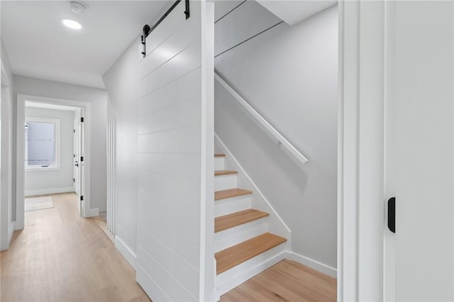 1211 Boyle St, Central North Side, PA 15212 - stairs featuring wood finished floors and a barn door