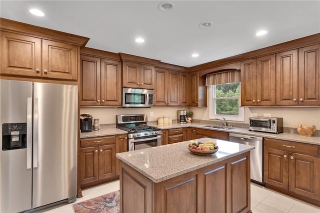 2899 E Elfinwild Rd, Hampton, PA 15101 - kitchen featuring stainless steel appliances, light tile patterned flooring, light stone counters, brown cabinetry, and recessed lighting