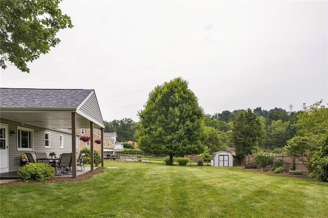 2899 E Elfinwild Rd, Hampton, PA 15101 - fenced backyard featuring a storage unit and a patio area