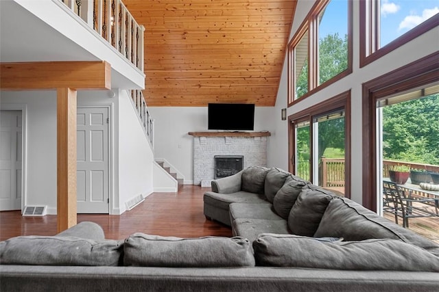 362 Ridge Rdg, Jackson Twp, PA 16063 - living area with high vaulted ceiling, stairway, a fireplace, wood finished floors, and wood ceiling