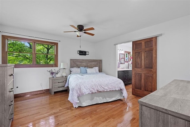 362 Ridge Rdg, Jackson Twp, PA 16063 - bedroom featuring light wood-style flooring, a ceiling fan, and ensuite bath