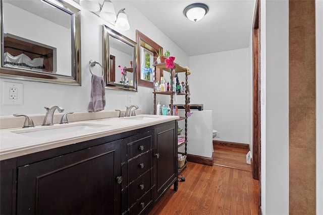 362 Ridge Rdg, Jackson Twp, PA 16063 - full bathroom featuring double vanity and wood finished floors