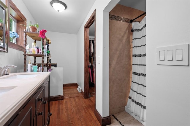 362 Ridge Rdg, Jackson Twp, PA 16063 - full bath with a shower with curtain, double vanity, and wood finished floors