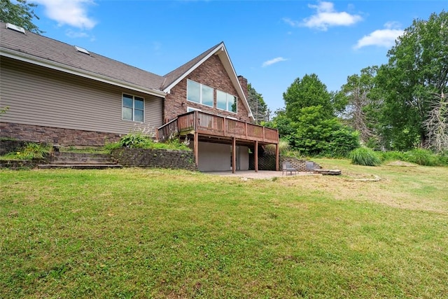 362 Ridge Rdg, Jackson Twp, PA 16063 - back of property featuring a wooden deck, a lawn, and a patio area
