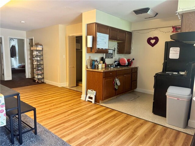 250 E Water St, Slippery Rock Boro, PA 16057 - kitchen featuring light wood finished floors and light countertops
