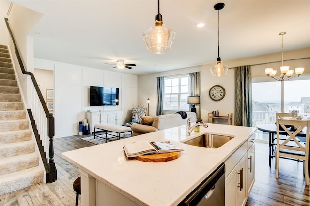 326 Stately Ct, Adams Twp, PA 16046 - kitchen with dishwasher, wood finished floors, and decorative light fixtures