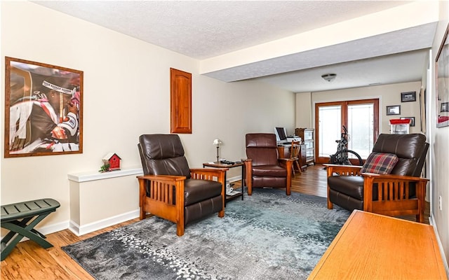 489 Jenny Dr, Richland, PA 15044 - living area featuring wood finished floors and a textured ceiling