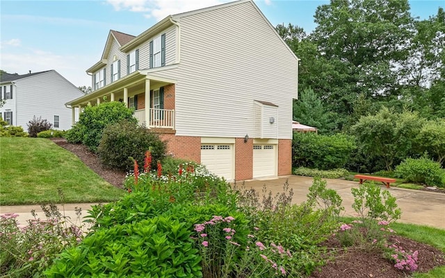 489 Jenny Dr, Richland, PA 15044 - view of side of home featuring brick siding, concrete driveway, a garage, and a yard