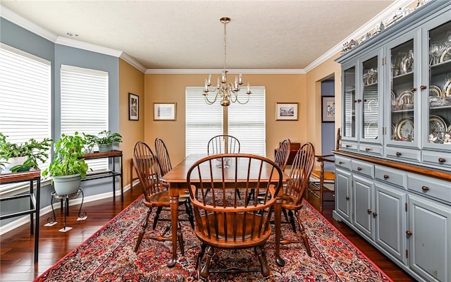 489 Jenny Dr, Richland, PA 15044 - dining room with a chandelier, dark wood-style floors, healthy amount of natural light, crown molding, and a textured ceiling