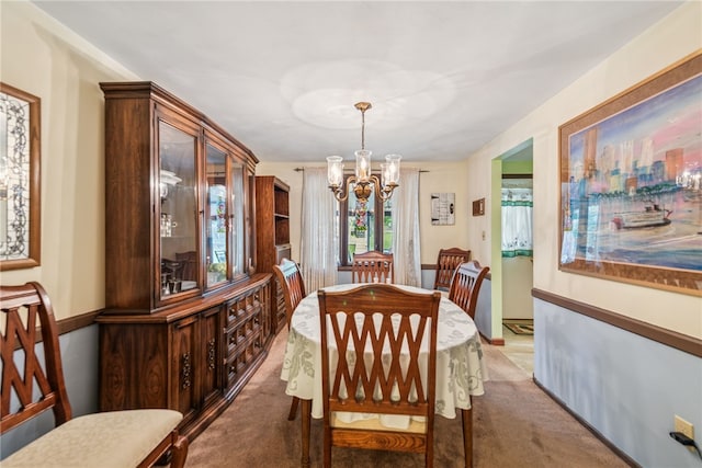 982 Braddock Rd, Forest Hills Boro, PA 15221 - dining room with carpet and a chandelier