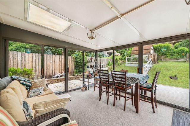 982 Braddock Rd, Forest Hills Boro, PA 15221 - sunroom / solarium with outdoor dining area, lofted ceiling, and carpet flooring
