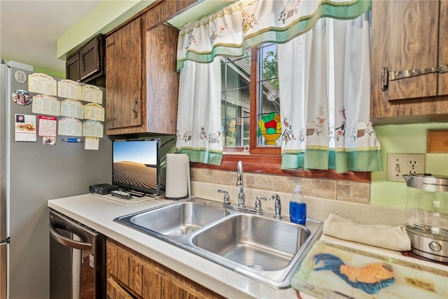 982 Braddock Rd, Forest Hills Boro, PA 15221 - kitchen featuring stainless steel dishwasher and light countertops