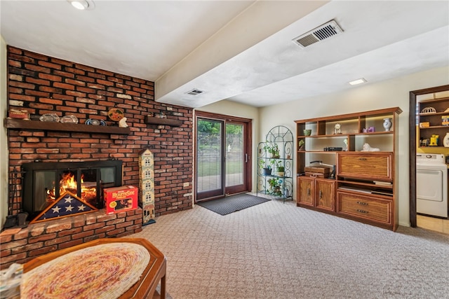 982 Braddock Rd, Forest Hills Boro, PA 15221 - living room with washer / clothes dryer, carpet, and a brick fireplace