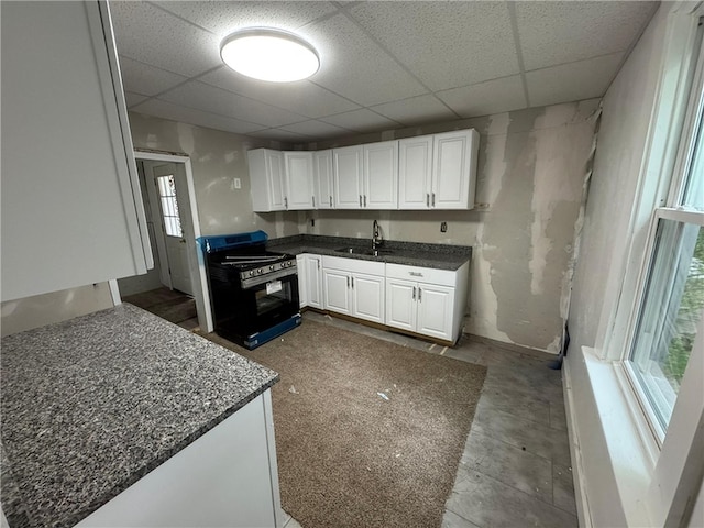 21 Hodgson Ave, Ingram, PA 15205 - kitchen featuring range with gas cooktop, white cabinetry, and a paneled ceiling