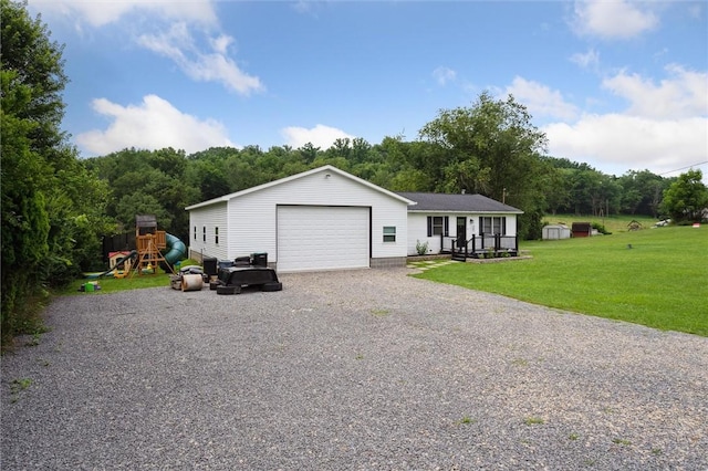 4 Ward St, Canton Twp, PA 15301 - ranch-style house with a front yard, a detached garage, and a wooded view