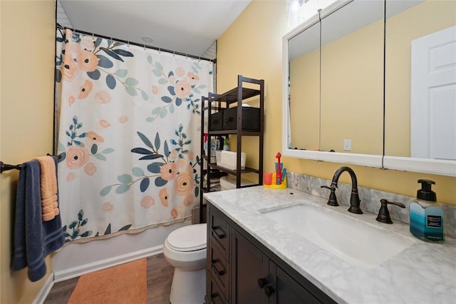 4 Ward St, Canton Twp, PA 15301 - bathroom with vanity, wood finished floors, and shower / tub combo with curtain