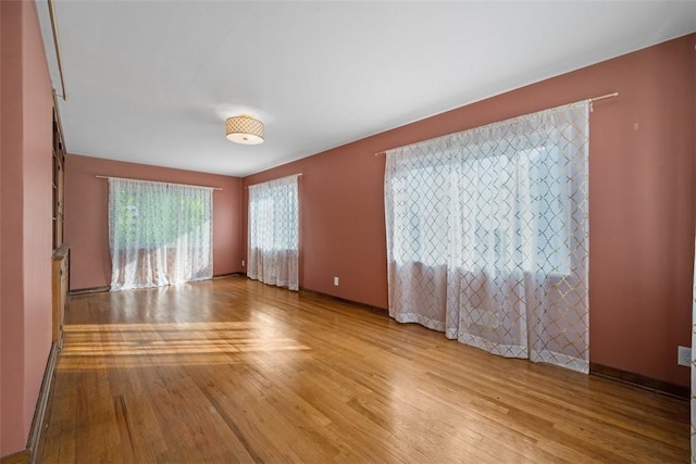 7604 Tyler Rd, Verona, PA 15147 - empty room with wood finished floors