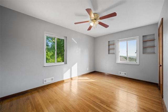 7604 Tyler Rd, Verona, PA 15147 - empty room featuring wood finished floors and ceiling fan