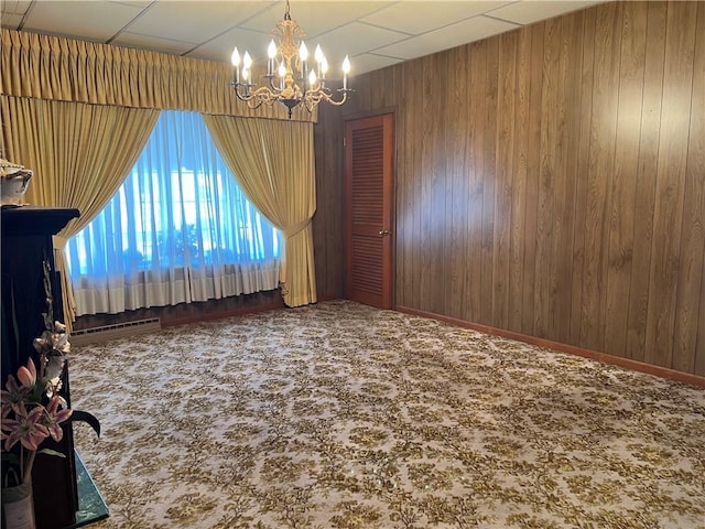 229 Fallowfield Ave, Charleroi Boro, PA 15022 - carpeted spare room with a chandelier and wood walls