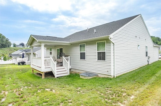329 Nelson Dr, Monroeville, PA 15146 - rear view of property featuring a lawn, a wooden deck, and a shingled roof