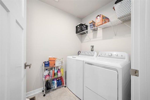 329 Nelson Dr, Monroeville, PA 15146 - laundry area featuring independent washer and dryer and light tile patterned flooring